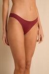 anja bikini low-rise bottom la rusée terracotta close up face