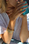 anja x daphine isa gold ring country background
